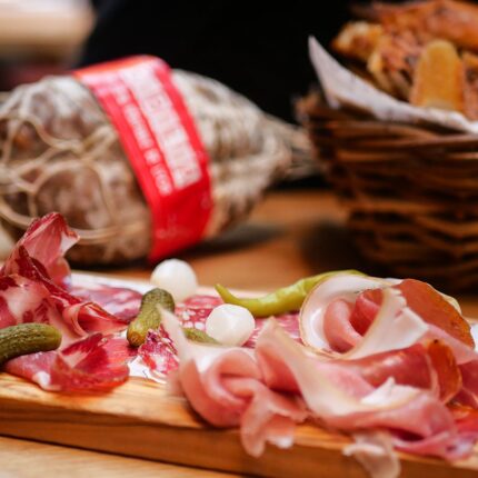Freshly sliced saucisson, prosciutto, and cornichons served at Galvin Spitalfields.