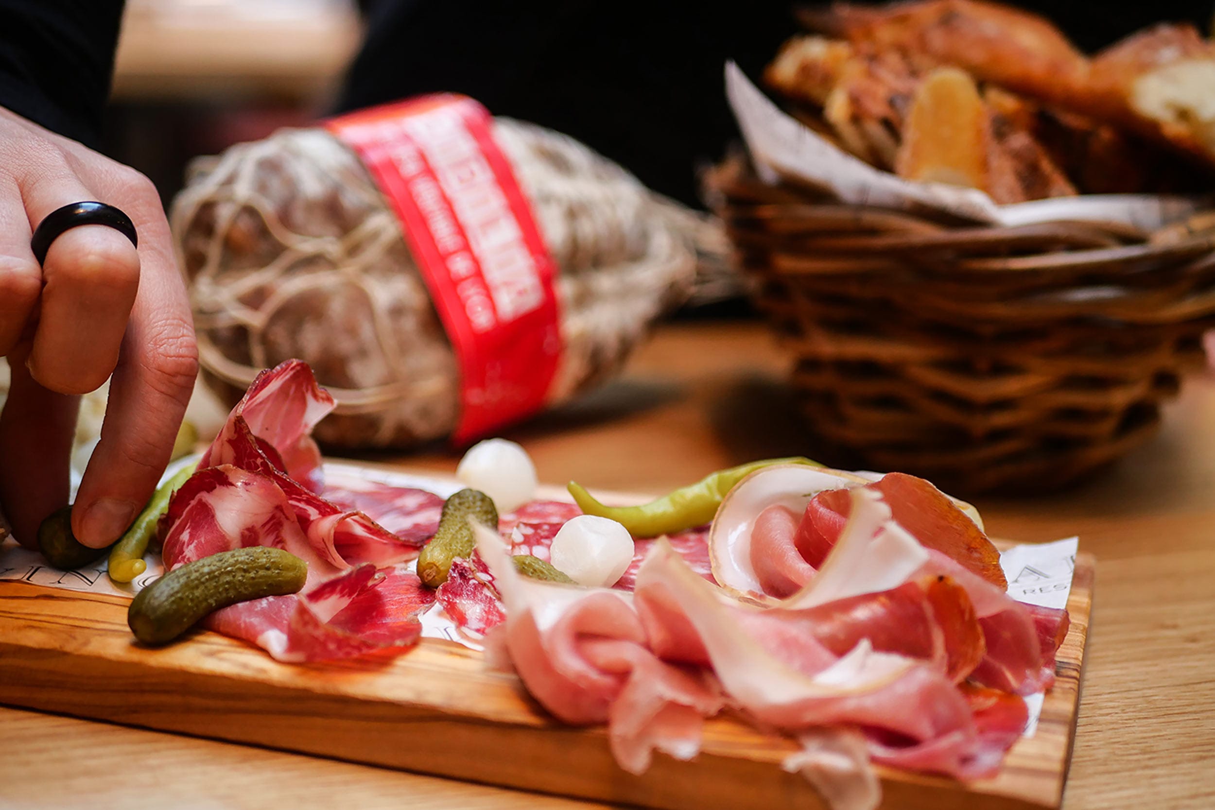 Freshly sliced saucisson, prosciutto, and cornichons served at Galvin Spitalfields.