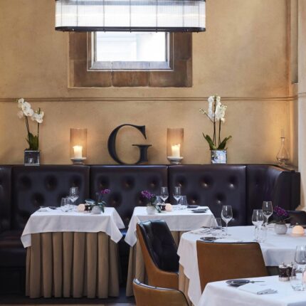 Gourmet roast chicken platter with traditional trimmings at Galvin La Chapelle London.