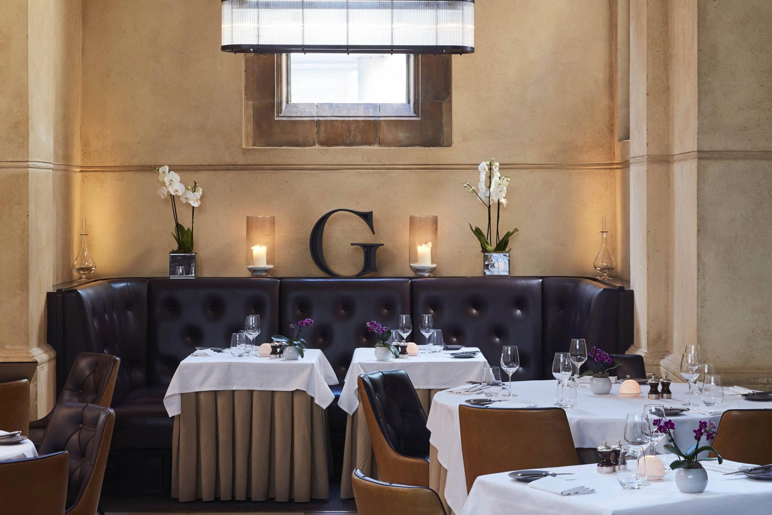 Gourmet roast chicken platter with traditional trimmings at Galvin La Chapelle London.