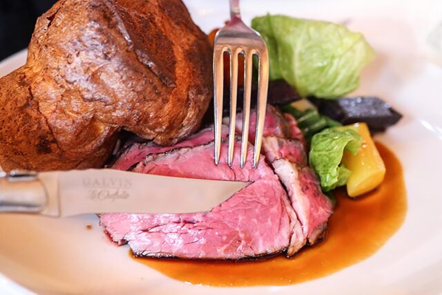 Perfectly pink roast beef with a rich red wine jus at Galvin's London Sunday lunch.