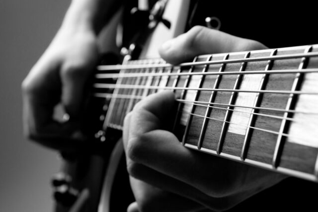 Acoustic singer performing live at the Galvin Green Man Friday music night in Essex.