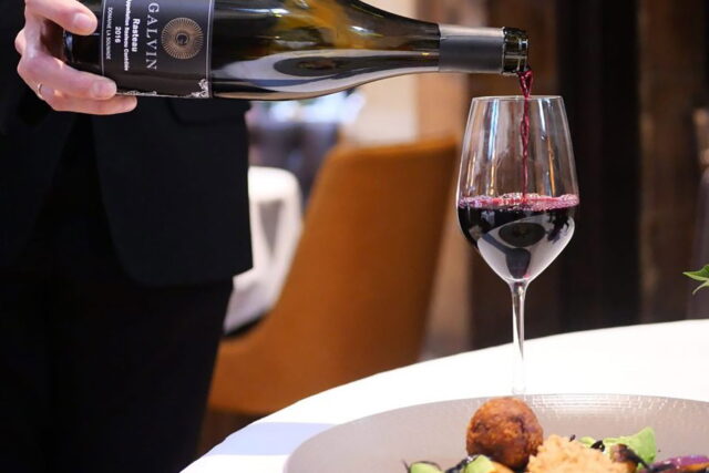 Sommelier pouring a crisp Provence rosé wine during the Galvin Bistrot and Bar dinner series.