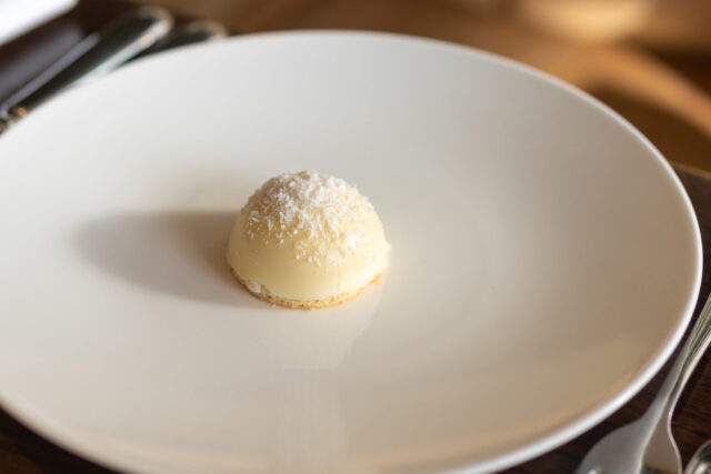Cracking a delicate chocolate shell to reveal a rich praline mousse at Galvin's.