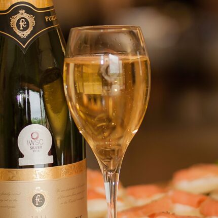 Chilled glasses of exquisite English white wine prepared for a seasonal pairing event in our Essex countryside pub.