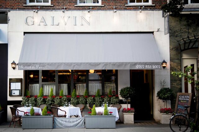 Galvin Restaurants executive team reviewing commercial property investments and site layout plans.