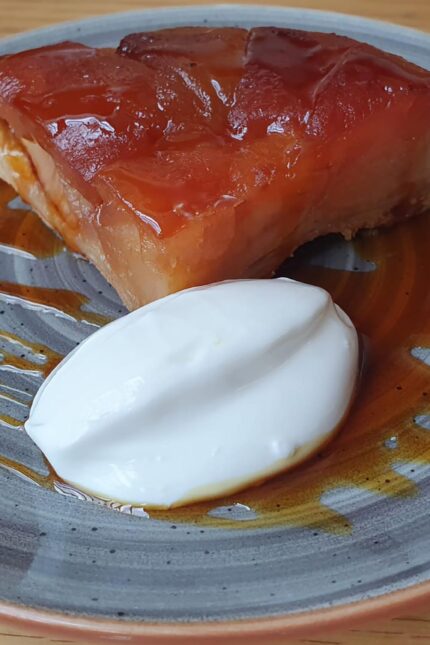 A stunningly glazed Galvin signature apple tarte Tatin served with a generous dollop of crème fraîche