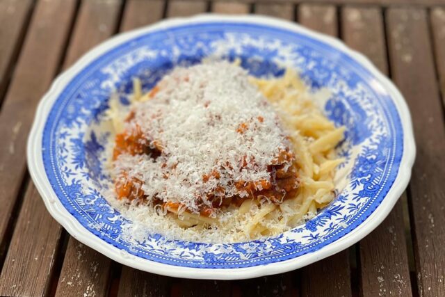 The ultimate Galvin family slow-cooked pasta Bolognese recipe served with Parmesan.