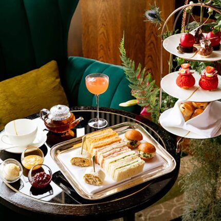 A traditional three-tiered afternoon tea stand served at Galvin in Mayfair, London.
