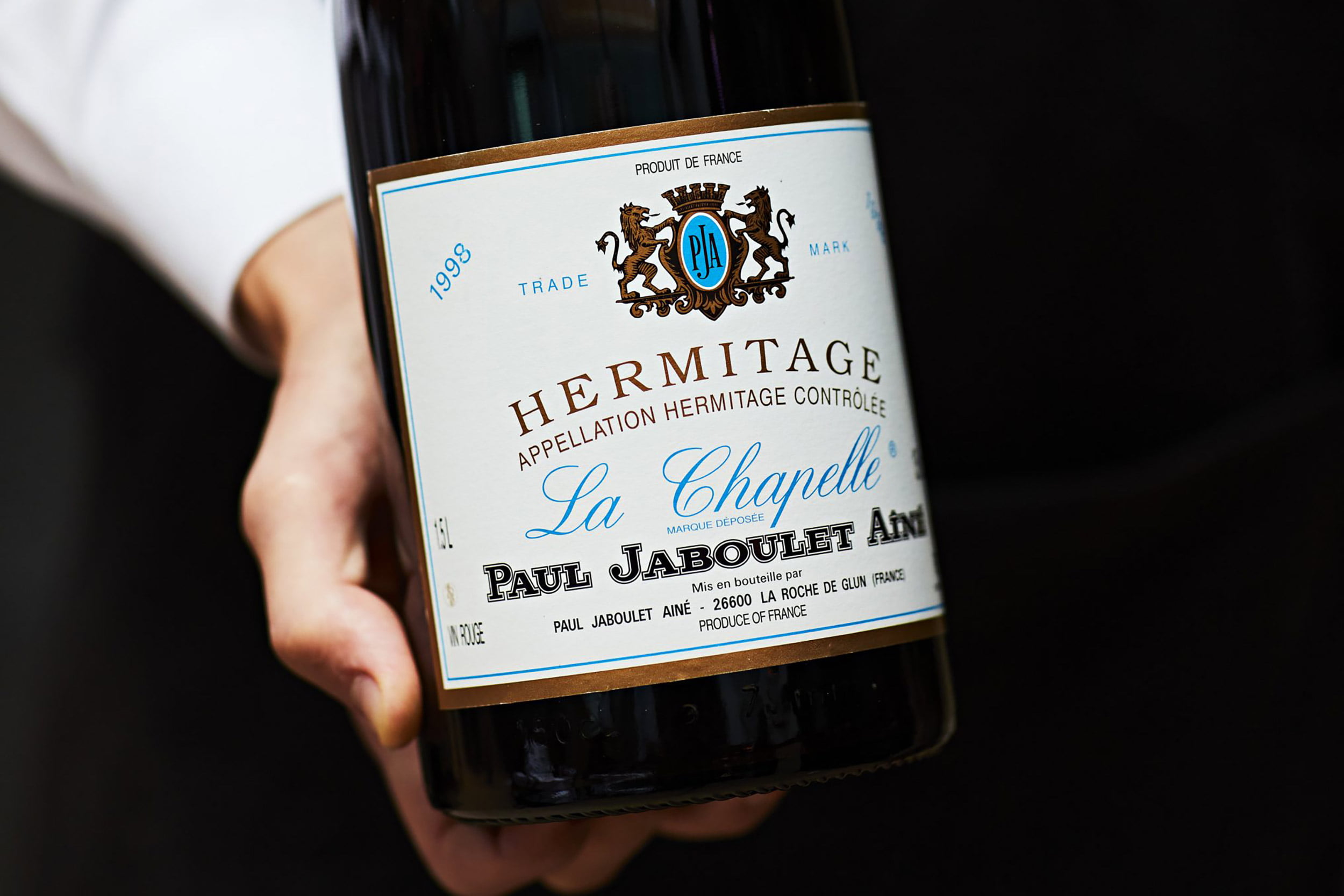 Expert sommelier service pairing fine Jaboulet vintages with French gourmet cuisine.