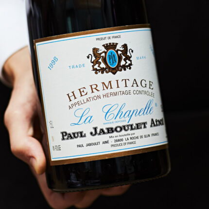 Expert sommelier service pairing fine Jaboulet vintages with French gourmet cuisine.