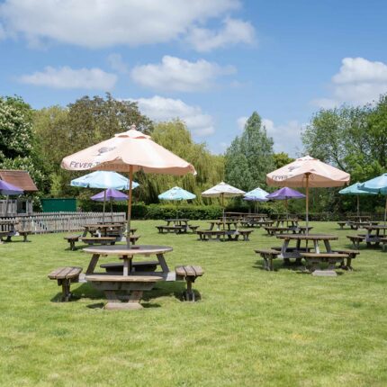 The spacious, beautifully landscaped beer garden at Galvin Green Man near Chelmsford.