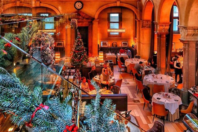 Elegant, festive ambient lighting inside Galvin Restaurants for New Year's Eve dining.