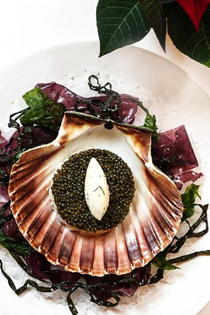 Elegant, festive ambient lighting inside Galvin Restaurants for New Year's Eve dining.