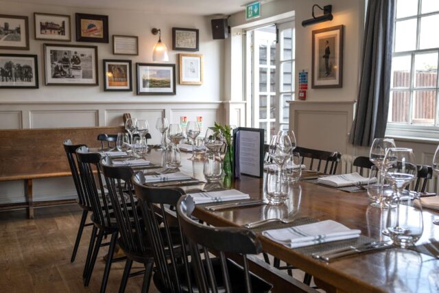 The Communal Room at Galvin Green Man: Elegant event space with tranquil Essex views.