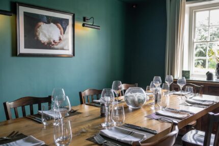 Elegant and comfortable dining room seating setup inside Galvin Green Man Essex.