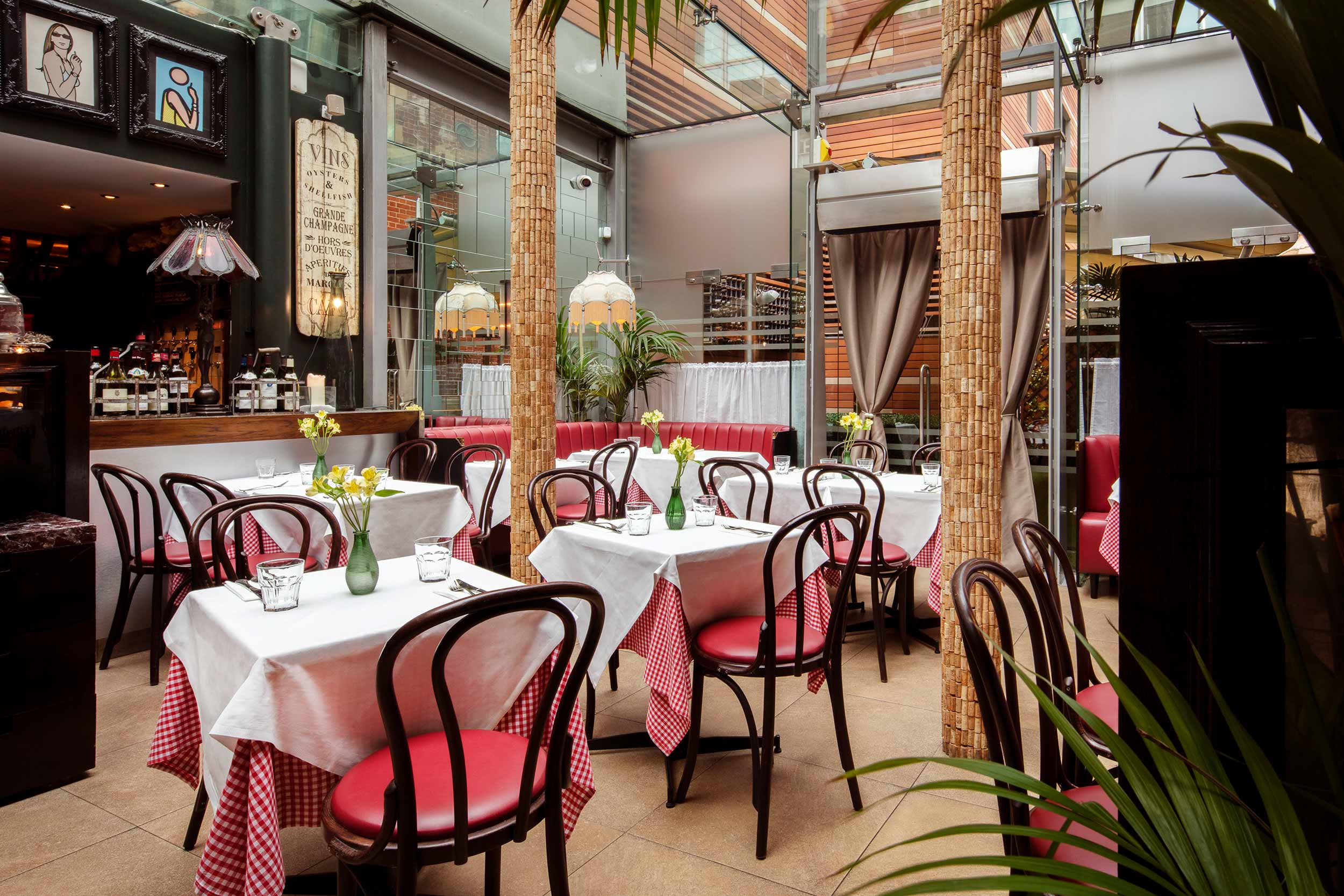 Chic conservatory-style conservatory dining area at our Spitalfields brasserie.