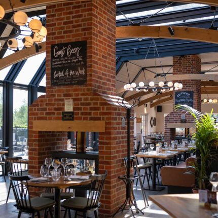 The beautiful, rustic-modern interior dining room at Galvin Green Man in Chelmsford.