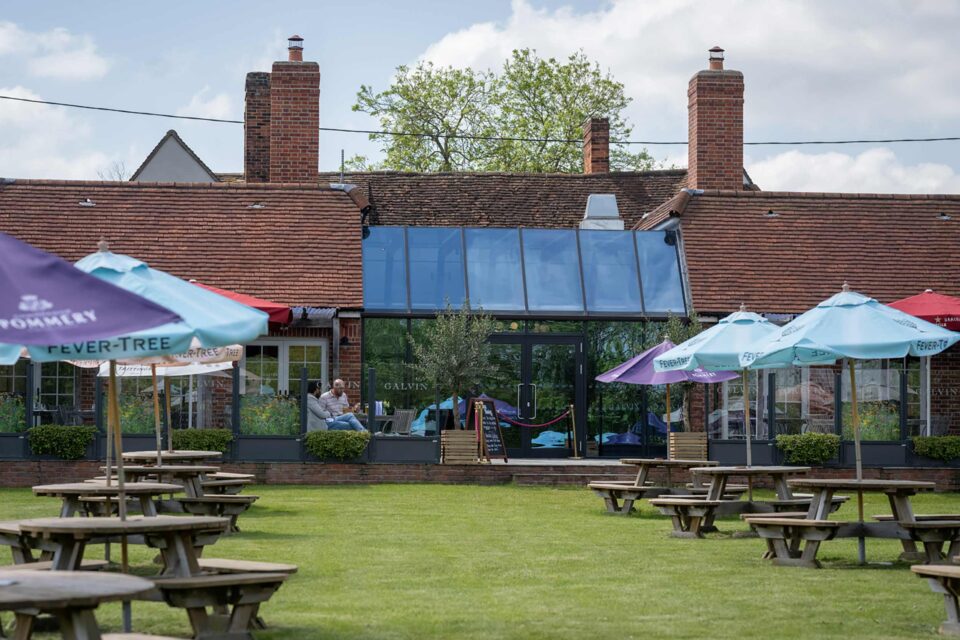 Beautifully landscaped outdoor terrace and alfresco seating at Galvin Green Man.