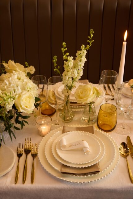 Beautiful floral centerpieces decorating the historic dining room for a Galvin wedding.
