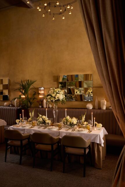 Stunning historic arched windows illuminating a romantic wedding layout at Galvin's.
