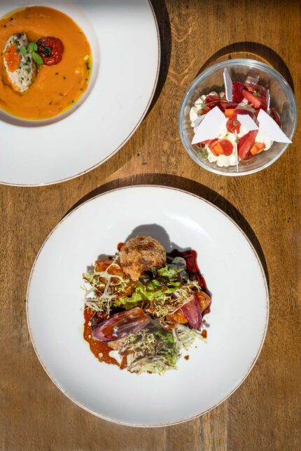An overhead view of the three-course Taste of Summer seasonal menu at Galvin Essex.