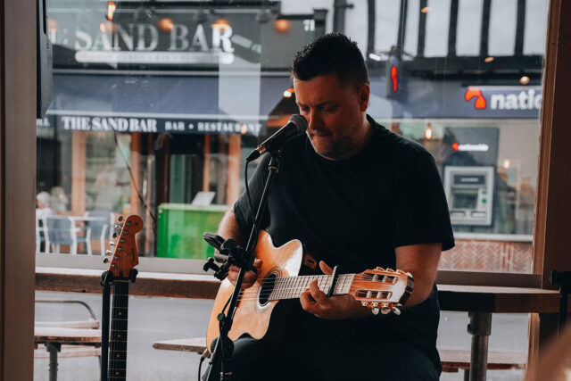 A musician performing live at Galvin Green Man, an award-winning pub in Chelmsford, Essex.