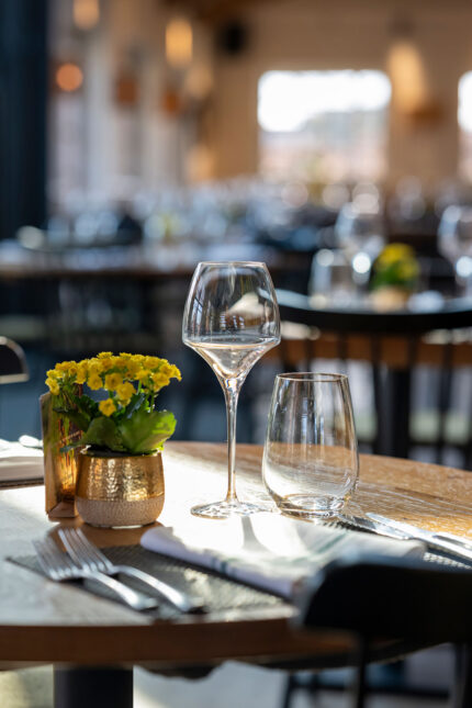 Elegant table setting inside the dining room of Galvin Green Man for the Honey and Co event.