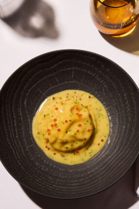 Exquisite seasonal raviolo dish with rich butter sauce and roe from the Autumn Table menu at Galvin La Chapelle in London