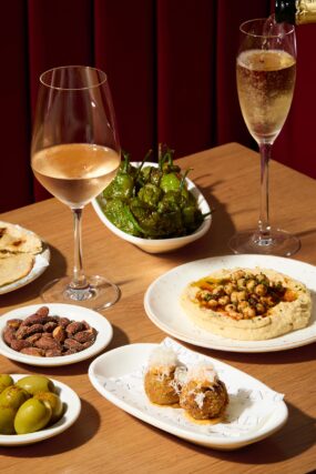 A delicious selection of sharing appetizers including croquettes, hummus, and padron peppers from the Autumn Table menu at Galvin Bistrot in Spitalfields.