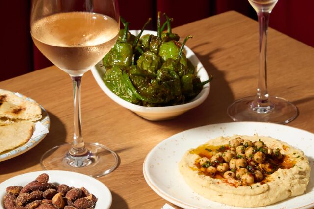 A delicious selection of sharing appetizers including croquettes, hummus, and padron peppers from the Autumn Table menu at Galvin Bistrot in Spitalfields.